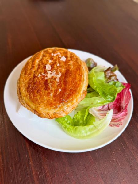 Scallops, flathead & swordfish, dill cauliflower purée, confit garlic, wrapped in golden puff pastry and served with a fresh side salad.