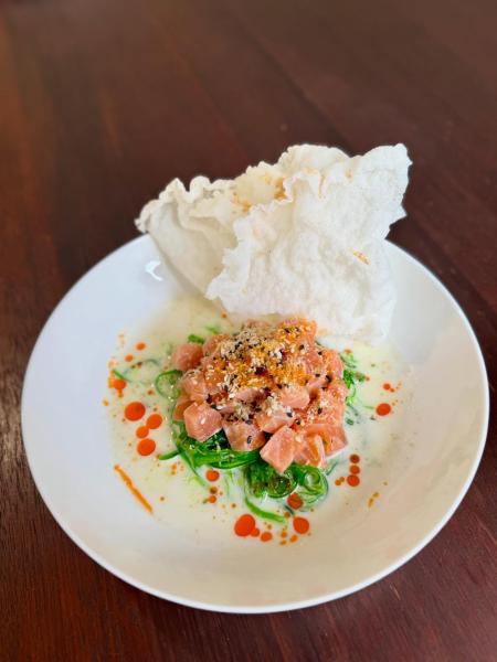 Coconut-ginger lime sashimi tartare, chilli oil, pickled seaweed — all on crispy rice paper 